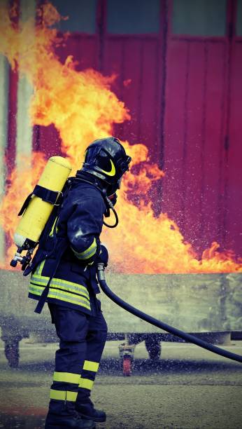 istock hot fire and the fireman with oxygen tanks 1088927130