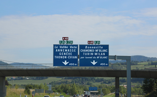 French road sign with directions to the Mont Blanc tunnel on the border with Italy in the motorway in France