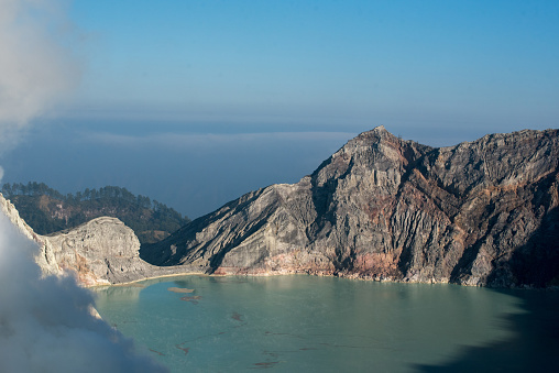 Image landscape of volcano forest and layers of mountain in Kawah Ijen, Indonesia