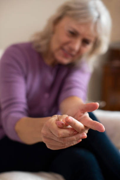 istock Senior Woman At Home Suffering With Arthritis 1088937564