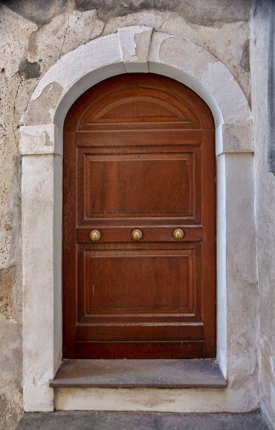 istock Medieval wooden door, adorned with stone 1088937728