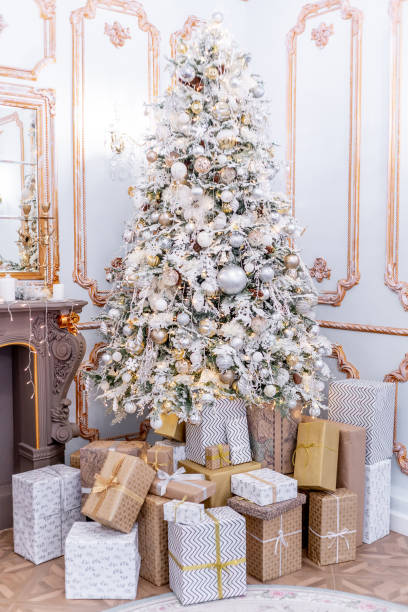 istock Christmas living room with a christmas tree and presents under it 1088939170