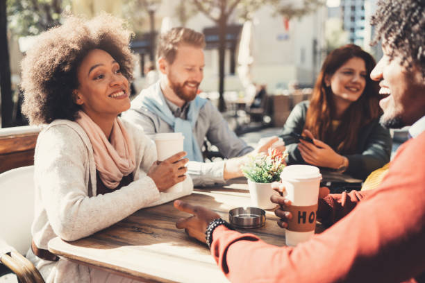 istock Multi-ethnic group of friends at cafe 1088944666