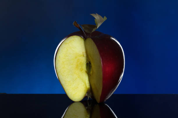 istock Cut red juicy apple close up 1088946728