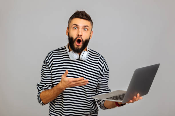 istock Nice surprised bearded man looking at you 1088946942