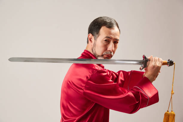 istock Senior master practicing qi qong taijiquan 1088952342
