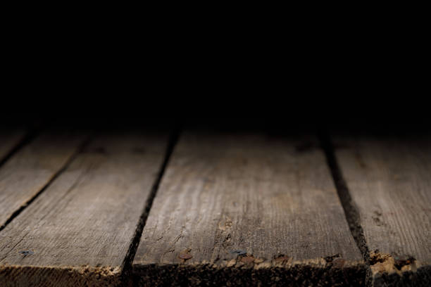 istock brown striped wooden background on black 1088958044