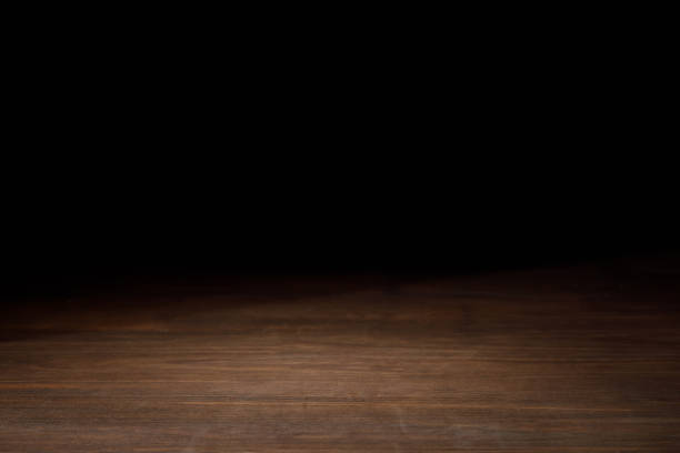istock brown striped wooden textured background on black 1088958160
