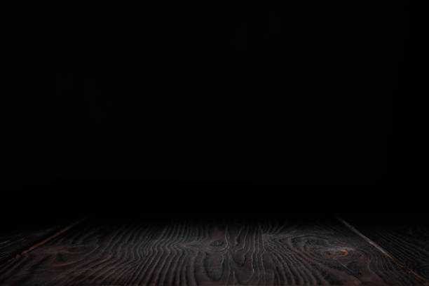istock dark grey striped hardwood on black 1088958168
