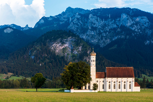 View at the bell towers and part of the church of the Catholic Maria Laach Abbey near Glees in Germany. The abbey dates back to the year1100 and is now a monastery of the Benedictine Confederation.