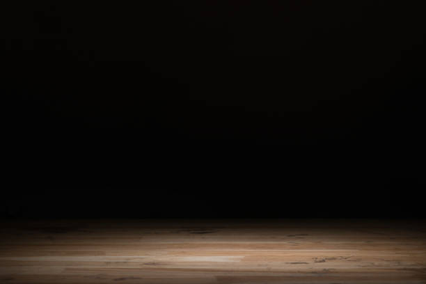 istock brown striped wooden background on black 1088958246