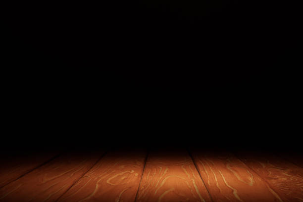 istock orange striped wooden background on black 1088958248