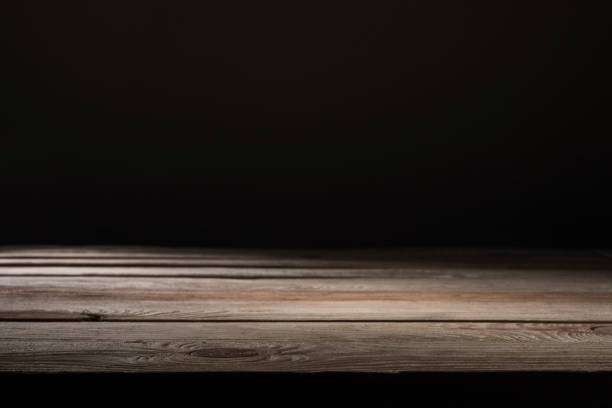 istock brown striped wooden textured background on black 1088958308
