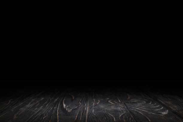 istock dark grey striped wooden background on black 1088958374
