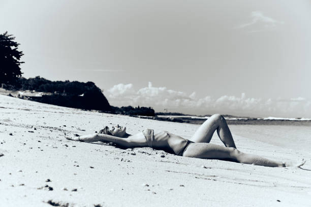 istock Slim woman enjoying on a sandy tropical beach. 1088958806