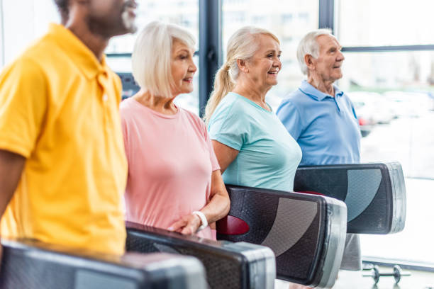 istock selective focus of senior athletes holding step platforms at gym 1088958850