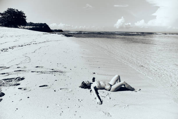 istock Slim woman enjoying on a sandy tropical beach. 1088958976