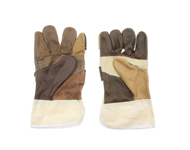 istock leather gloves for welding on white background 1088972994