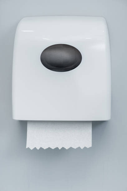 istock close up of paper roll in white holder isolated on grey 1088974132