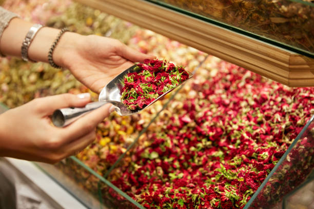 istock Natural Flower Tea. Hands Taking Tea From Showcase 1088977536