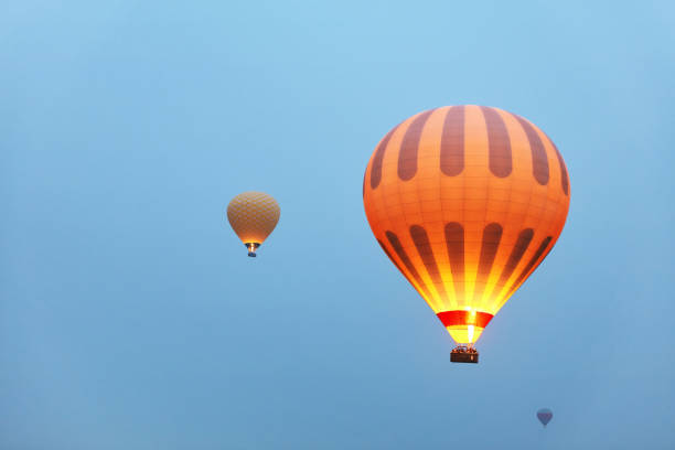 istock Hot Air Balloons With Fire Light Flying In Blue Sky, Travel 1088978570