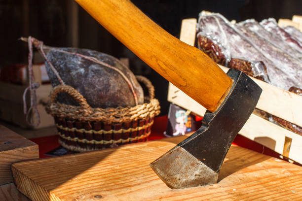 Meat axe on a wooden deck. Ax Butcher