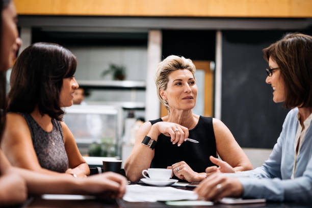 istock Female experts debating important business topics during coffee break 1088987372