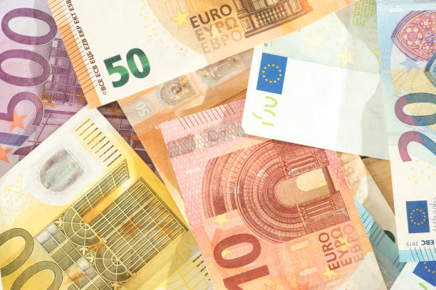 close-up of many euro banknotes - eurozone debt crisis imagens e fotografias de stock