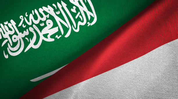 istock Indonesia/Monaco and Saudi Arabia two flags together realations textile cloth fabric texture 1089001564