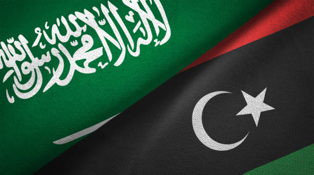 istock Libya and Saudi Arabia two flags together realations textile cloth fabric texture 1089001670