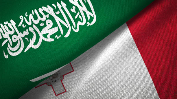 istock Malta and Saudi Arabia two flags together realations textile cloth fabric texture 1089001728