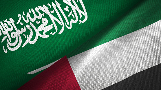Emiratos Árabes Unidos y Arabia Saudita dos banderas juntos relaciones textil tela textura de la tela photo
