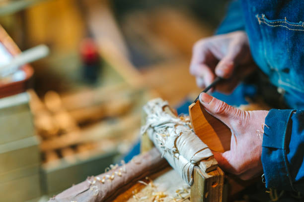 istock Asian man making craft from wood 1089003700