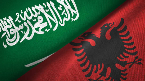 istock Albania and Saudi Arabia two flags together realations textile cloth fabric texture 1089003980