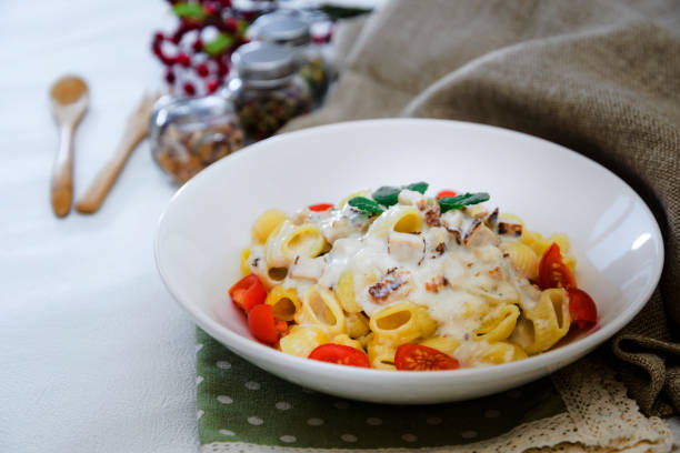istock Tagliatelle with chicken, mushrooms, cream and chives 1089004572