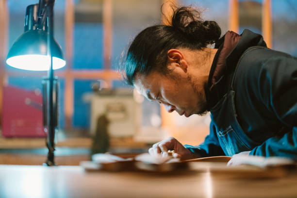 istock Asian man making craft from wood 1089004582