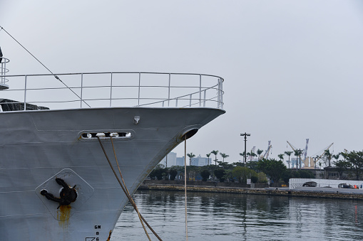 Aerial view of naval ship travelling in San Diego Bay, San Diego, California, USA.