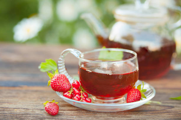 istock wild strawberry tea in beautiful cup 1089010880