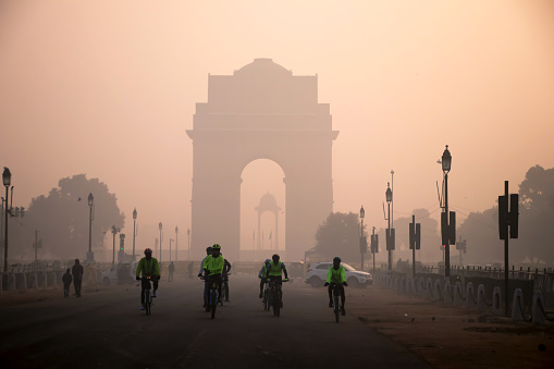 Image of winter fog scene in Delhi with India gate as a background