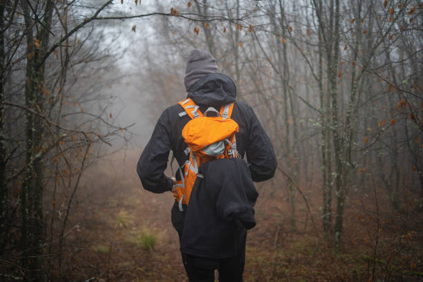 istock Traveler with backpack walking in a foggy forest 1089029356