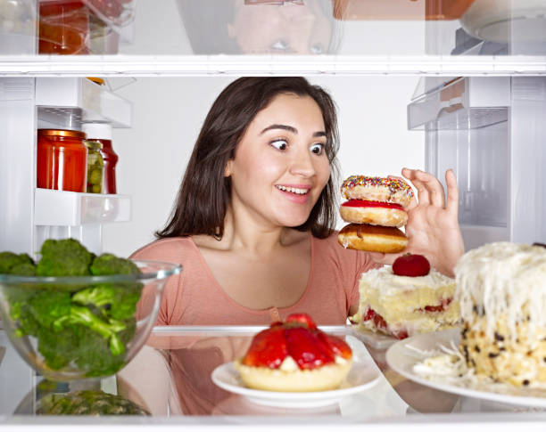 istock Woman in love with desserts 1089035280