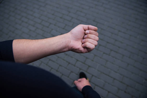 istock cropped view of male hand with bricks on background 1089035958