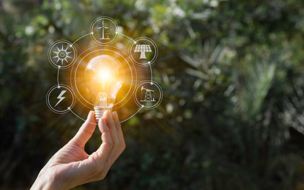 istock Hand holding a light bulb. Energy saving light bulb. Innovation and creative concept. 1089036338
