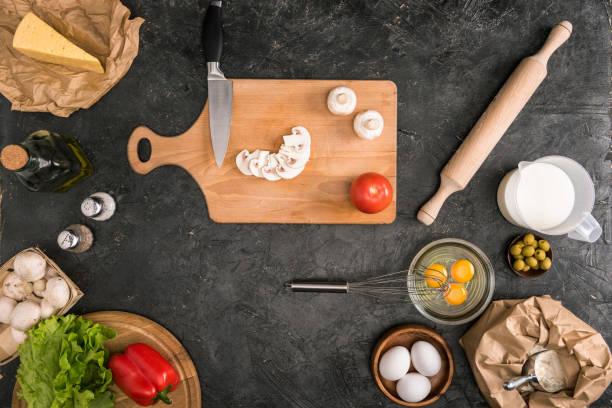istock pizza ingredients and cooking utensils on grey background 1089040346
