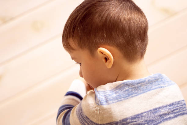 istock little boy plays with toy car at home. 1089042730