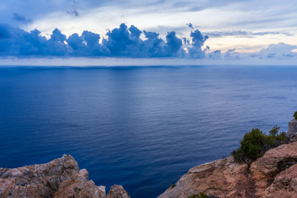 istock Greece, Zakynthos, Endless sea view in twilight after tunset with dramatic clouds 1089043330