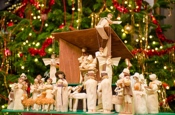 istock Christmas nativity scene with blurred Chrstmas tree in background. 1089046938