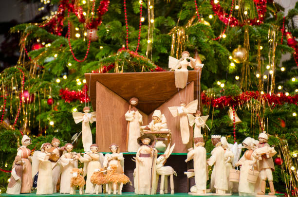 istock Christmas nativity scene with blurred Chrstmas tree in background. 1089046972