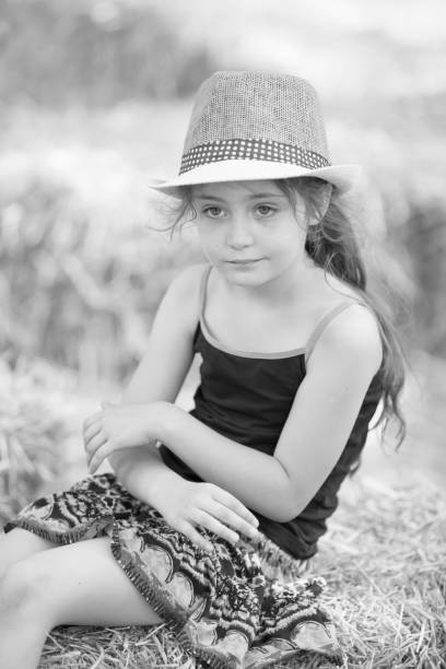 istock Little girl playing in the hay 1089049290