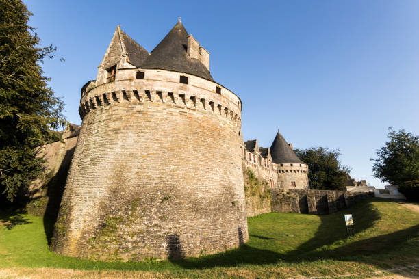 Pontivy, France. The Chateau des Rohan with its moat, a medieval castle with large round towers in central Brittany (Bretagne)